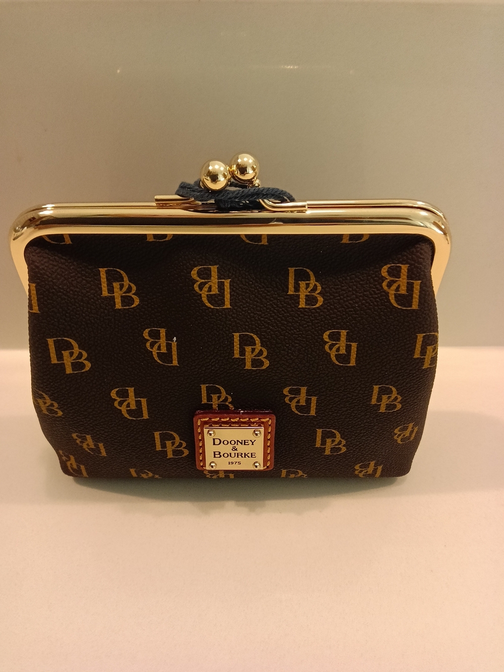 Dooney & Bourke Gretta Large Frame Brown Signature Coin Purse with Gold Trim